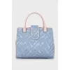 Quilted denim bag with tag