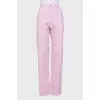 Pink jeans with tag