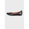 Black ballerinas decorated with studs