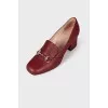 Burgundy shoes with silver decor