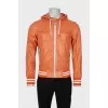 Men's orange windbreaker with tag