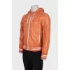 Men's orange windbreaker with tag