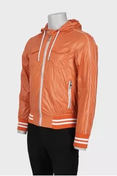 Men's orange windbreaker with tag