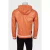Men's orange windbreaker with tag