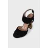 Suede sandals with figured heels