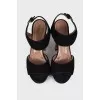 Suede sandals with figured heels