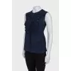 Sleeveless blouse with appliqué