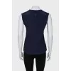 Sleeveless blouse with appliqué