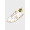 White lace-up sneakers