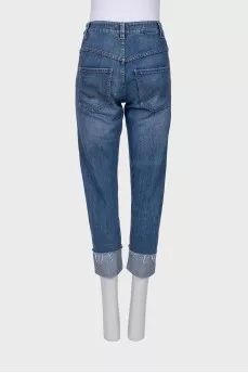 Blue jeans with embellished hem