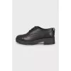 Black leather brogues