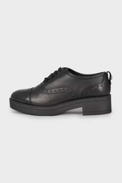 Black leather brogues