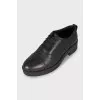 Black leather brogues