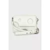 Leather crossbody bag with tag