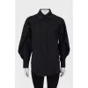 Black shirt with ruffled sleeves
