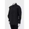 Black shirt with ruffled sleeves