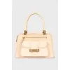 Beige bag with gold hardware