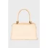 Beige bag with gold hardware