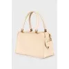 Beige bag with gold hardware