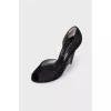Black shoes decorated with rhinestones