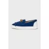 Suede slip-ons with fringes