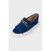 Suede slip-ons with fringes