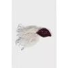 Brooch decorated with feathers