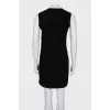 Black dress decorated with beads