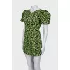 Black dress in green print