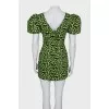 Black dress in green print