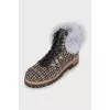 Textile boots decorated with fur