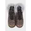Textile boots decorated with fur