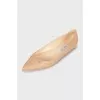 Leather ballet flats decorated with rhinestones