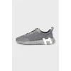 Gray trainers with ribbed soles