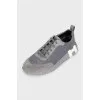 Gray trainers with ribbed soles