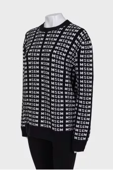 Black and white sweater with brand logo