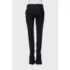 Wool trousers with slits at the bottom
