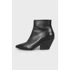 Black сossacks with a pointed toe