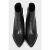 Black сossacks with a pointed toe