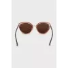 Sunglasses with mirrored lenses
