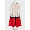 Dress with pleated hem
