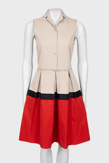 Dress with pleated hem