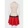 Dress with pleated hem