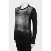 Sweater with perforations and rhinestones