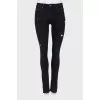 Black ripped effect jeans