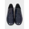 Dark blue lace-up shoes