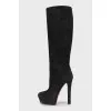 High-heeled suede boots