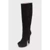 High-heeled suede boots