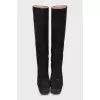 High-heeled suede boots
