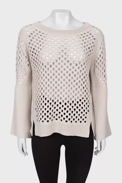 Wool sweater with perforations